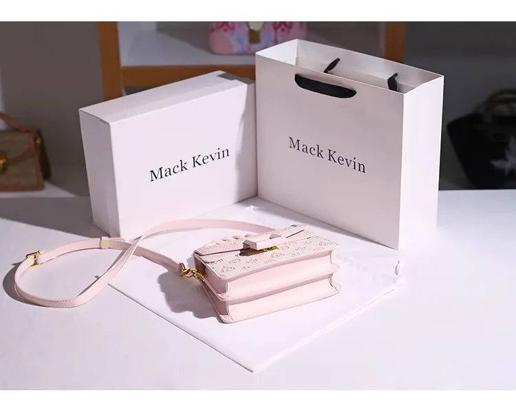 DELICATE HANDHELD BAG