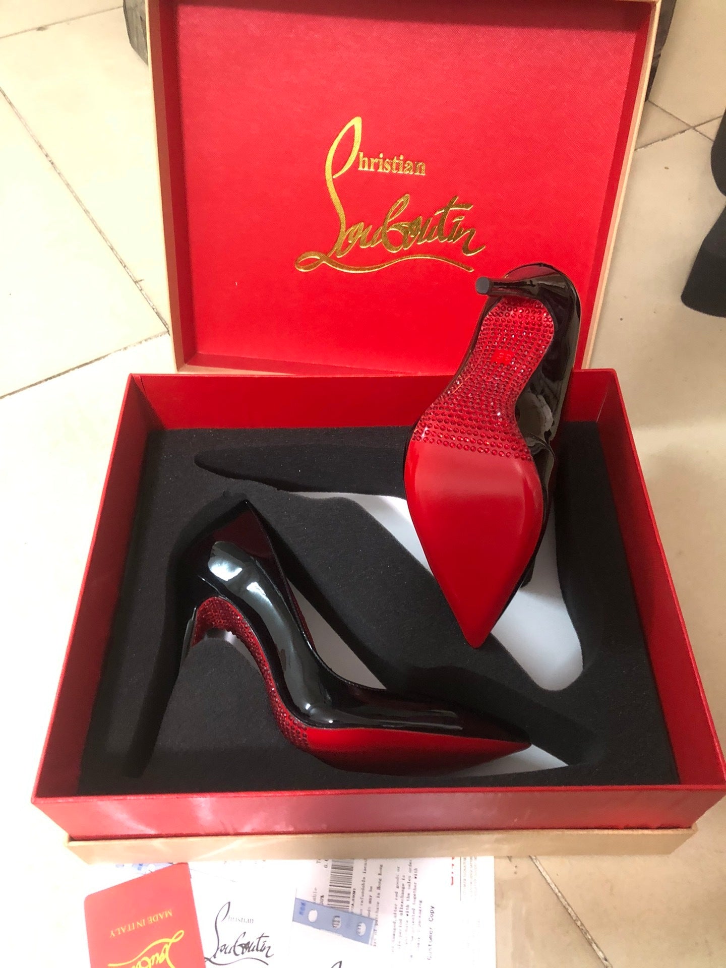 OP-LOUBOUTIN-GLOSSY
