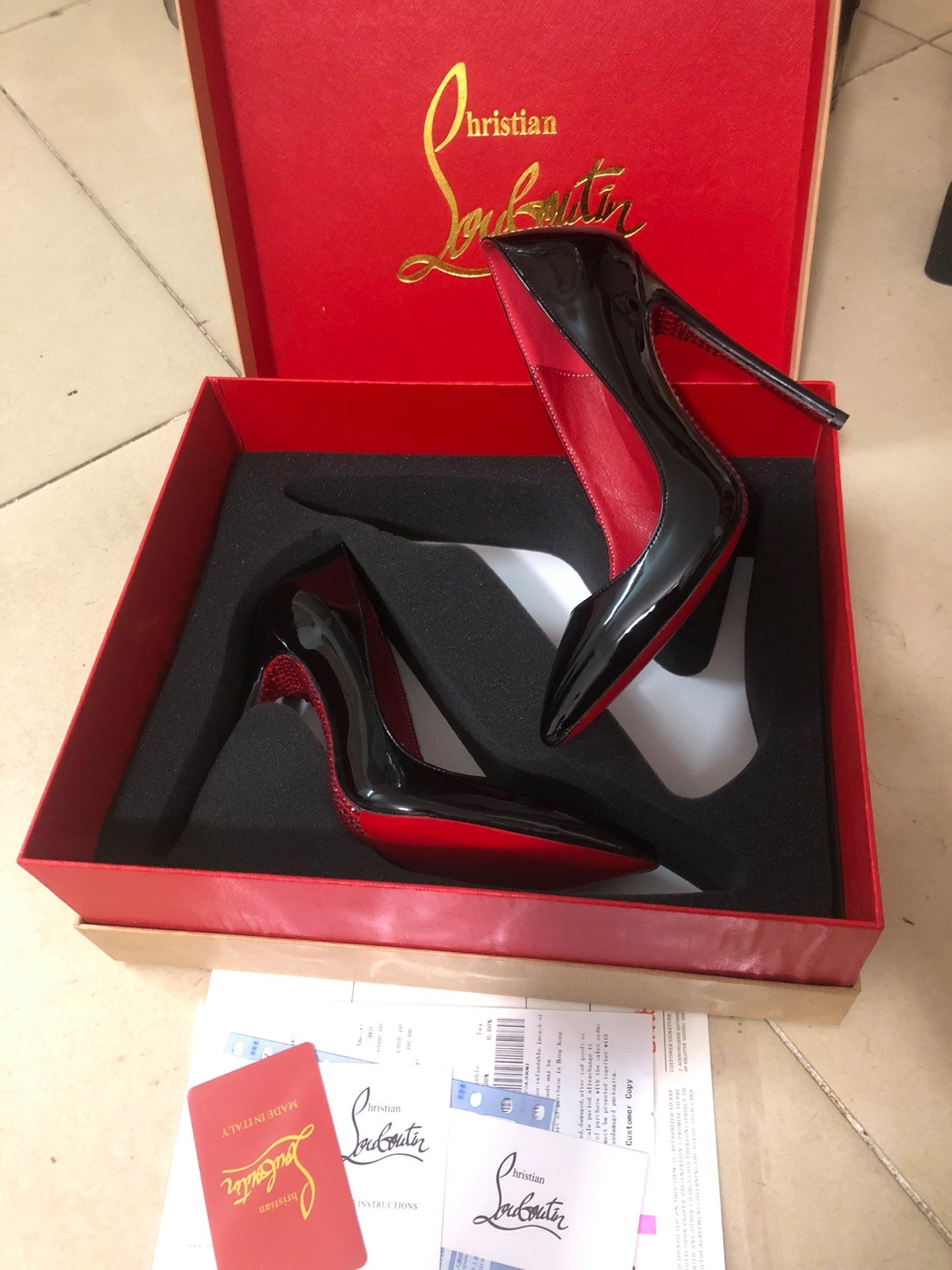 OP-LOUBOUTIN-GLOSSY