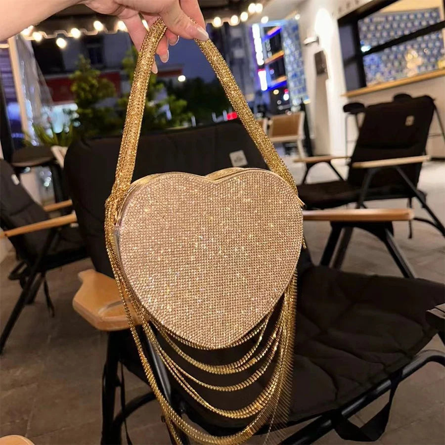SHINY HEART TASSEL CLUTCH