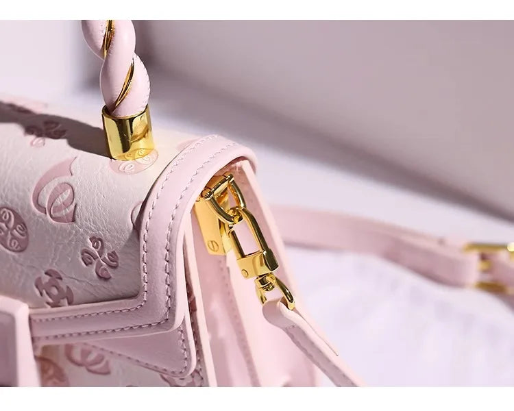 DELICATE HANDHELD BAG