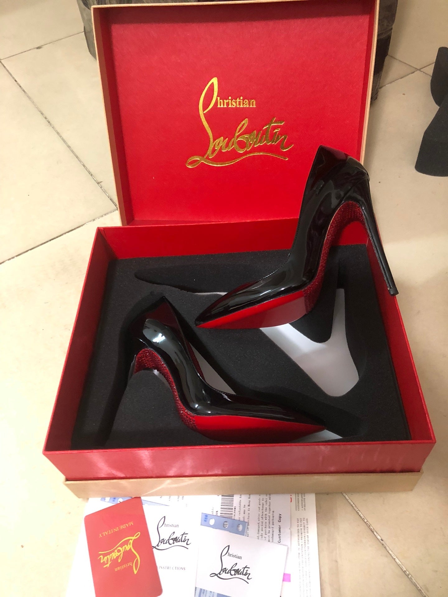 OP-LOUBOUTIN-GLOSSY